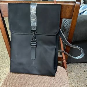 Brand new rains black waterproof backpack